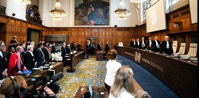 What are the ICJ and the ICC and how do their power and jurisdiction differ?