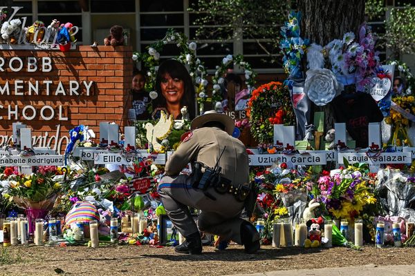Families of Texas' Uvalde school shooting reach settlement with city but sue 100 police officers over response