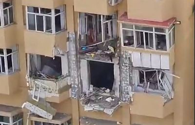 An explosion at an apartment building in Harbin, China, kills at least 1 and injures 3