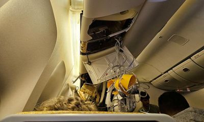 ‘Sheer terror’: three Australians in intensive care after Singapore Airlines flight hit turbulence