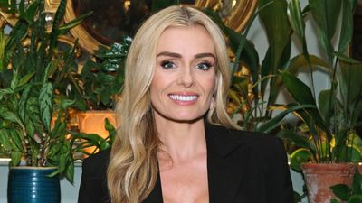 Katherine Jenkins' flirty pink and red midi dress is colour-blocking at its best