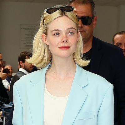 Elle Fanning Elevates Her Cannes Travel Outfit Through an Underrated Spring Color Trend