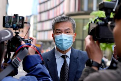 2 men to go on trial for allegedly helping Hong Kong authorities gather intelligence in UK