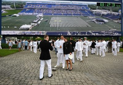 Defense secretary tells US Naval Academy graduates they will lead 'through tension and uncertainty'