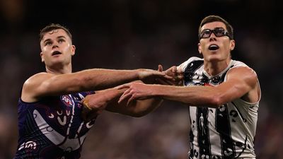 AFL ticks off free kick as Magpies fume after draw