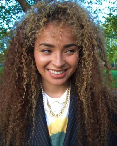 Ella Eyre Radiates Confidence And Charm In Close-Up Portrait