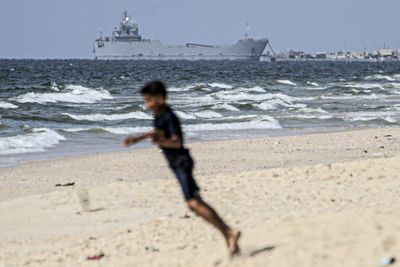 Vessels supporting US-built Gaza aid pier wash away in heavy seas