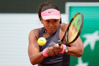 Naomi Osaka overcomes nerves to get off to winning start at French Open