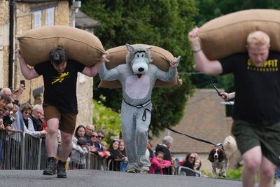 Chasing cheese wheels or lugging sacks of wool, UK competitors embrace quirky extreme races