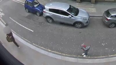 Dramatic CCTV shows mum taking photo of daughter having iPhone snatched by teenage robber on bike