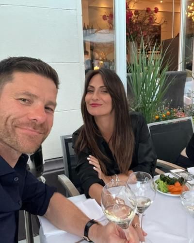Capturing Moments: Xabi Alonso And Friend Share Laughter