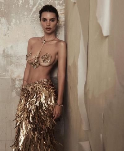 Emily Ratajkowski Shines In Golden Outfit, Exuding Confidence And Glamour