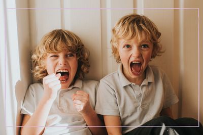 Therapist shares why kids laughing and not showing remorse when they're told off is completely normal (and makes total sense)