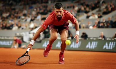 Djokovic overcomes form struggles and crowd in first round win at French Open
