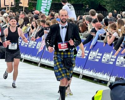 Scottish runner breaks world record for marathon in full Highland dress