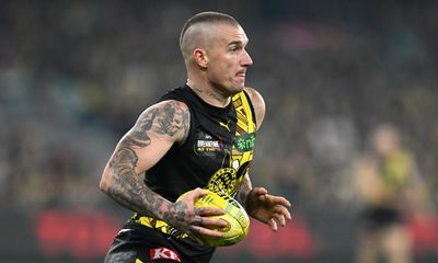 Dustin Martin holds up his end of the bargain as the AFL’s silent superstar