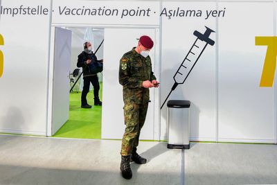 Germany scraps a COVID-19 vaccination requirement for military servicepeople