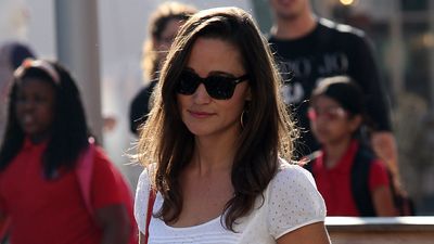 Pippa Middleton’s timeless white dress and cherry red accessories for day in London is the simple summer look we’re recreating