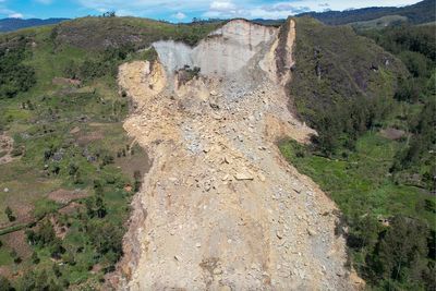 Papua New Guinea landslide survivors slow to move to safer ground after hundreds buried