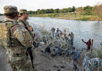 Texas National Guard reportedly shoots pepper balls at migrants on Mexico's side of the border