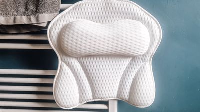 This ergonomic bath pillow from Amazon has transformed my baths into hotel-style experiences