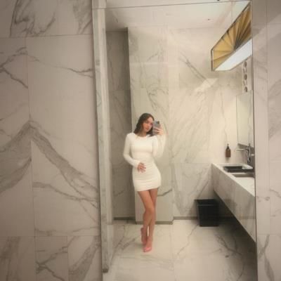 Caitlin Halderman Exudes Elegance In Stunning White Photoshoot