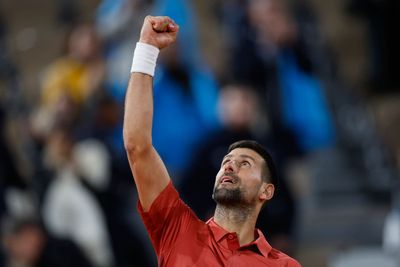 French Open day five: Novak Djokovic races to win over Roberto Carballes Baena