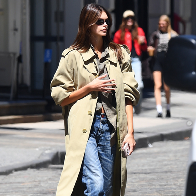 From Hailey Bieber to Kaia Gerber the Classic Trench Coat Is the One Piece Celebrities Can’t Stop Wearing Right Now—Here’s Why