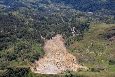 Papua New Guinea prime minister visits site of massive landslide estimated to have killed hundreds