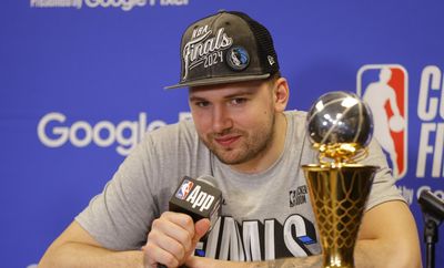 Luka Doncic made the funniest face when Mavericks VP Michael Finley stole a beer from him