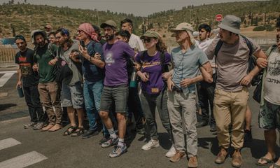 ‘Solidarity over hatred’: the small band of Israelis stopping settlers obstructing aid trucks