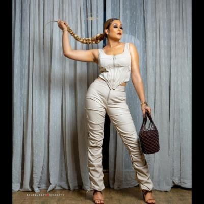 Adunni Ade Stuns In Sophisticated White Ensemble And Classic Accessories