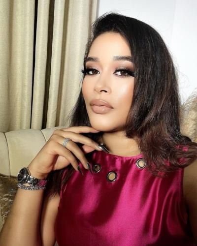 Adunni Ade Stuns In Vibrant Pink Ensemble With Confidence