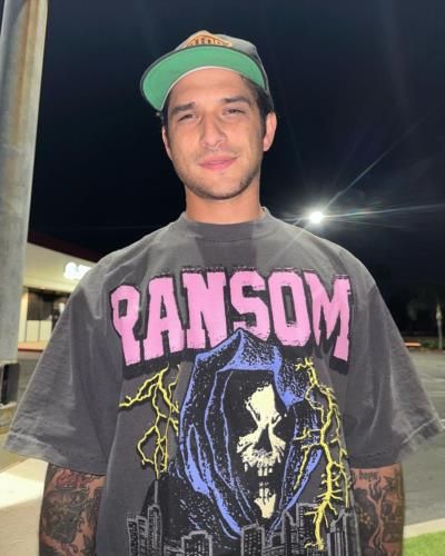 Tyler Posey: Urban Chic Icon Shining In City Lights
