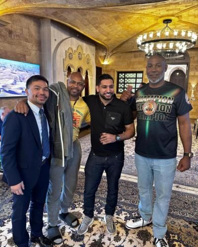 Celebrating Friendship: Lennox Lewis And Friends Strike A Pose