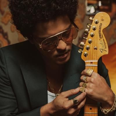 Bruno Mars Stuns In Stylish Photoshoot With Guitar