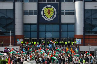 Scotland v Israel match delayed as protester chains self to goalpost