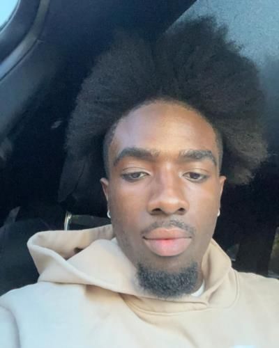 Caleb Mclaughlin Playfully Debates Hairstyle Choices In Selfies