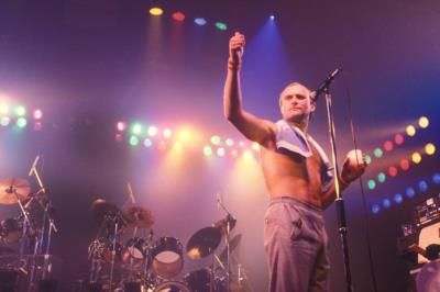 Phil Collins Radiates Joy In Vintage On-Stage Snapshot