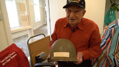 D-day veteran shares memories of storming Normandy beaches, liberating camp