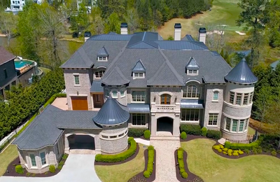 This 16,000-square-foot Georgia home overlooks the 18th green on a Tom Watson-designed golf course