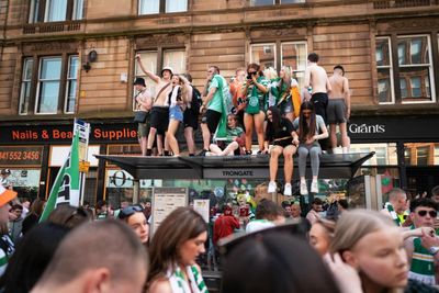 Terrified tourists hounded out of Glasgow by football fans’ title party disorder
