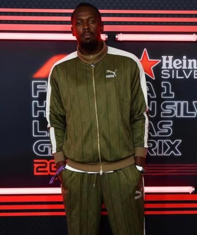 Usain Bolt's Iconic Style Shines In Sleek Tracksuit Pose