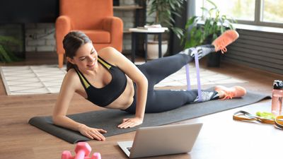 Strengthen your core and lower body with this trainer's four-move resistance band workout