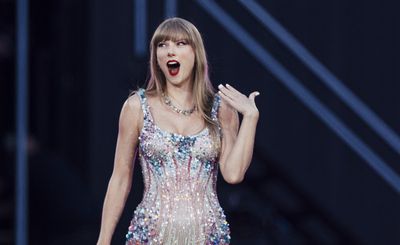 Taylor Swift had the biggest smile while singing about ‘dating the boy on the football team’