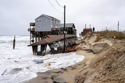 Outer Banks homes are collapsing due to climate change, but coastal property values are booming anyway