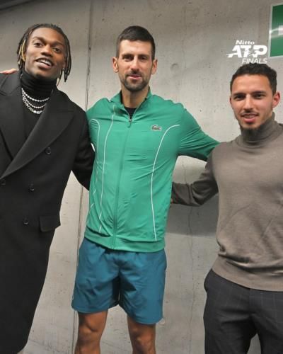 Novak Djokovic And Friends Posing In A Group Photo