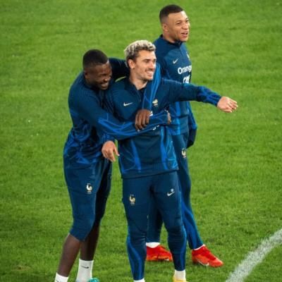 Antoine Griezmann And Teammates In Matching Blue Jerseys Pose Together