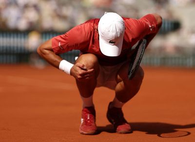 Novak Djokovic’s Wimbledon and Olympic hopes in jeopardy after knee injury