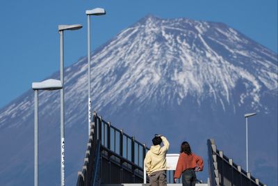 Second Japan town blocks view of Mount Fuji in battle with problem tourists